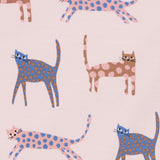 Close up of the Pigeon Organics pink cats design. Showing the different coloured playful cats with spots on light pink organic cotton fabric