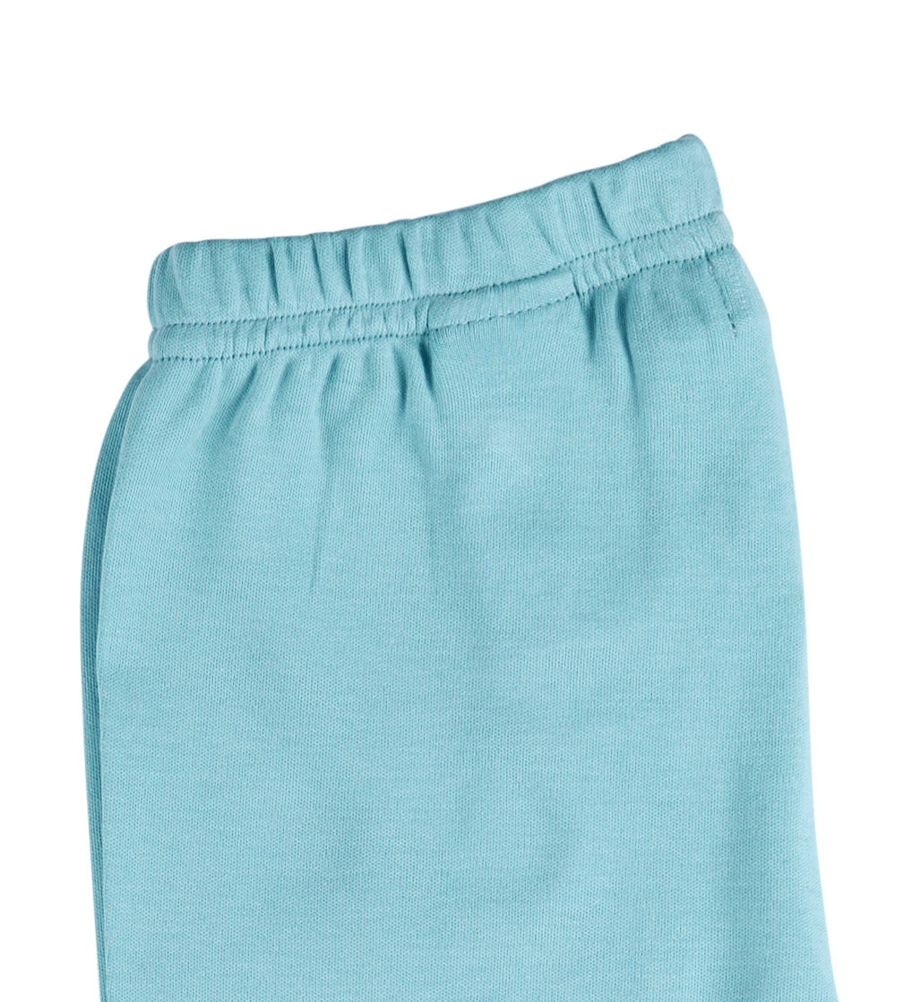 A close up of the Pigeon Organics turquoise leggings available at Babipur showing the elasticated waistband detail