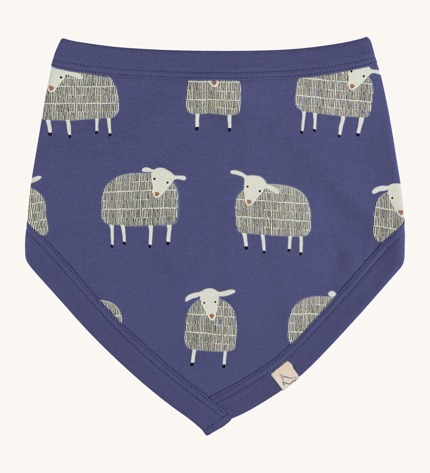 Pigeon Organics bib. A 100% GOTS organic cotton bib in pale blue with a white sheep print all over