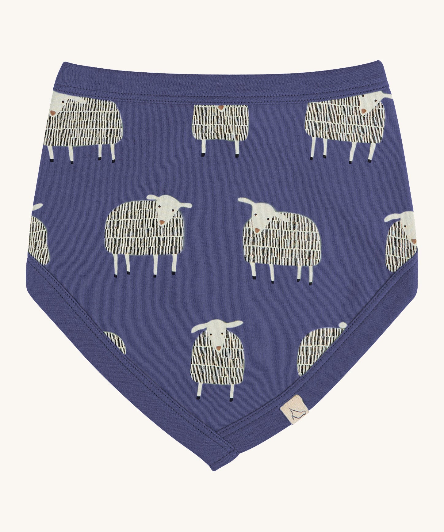 Pigeon Organics bib. A 100% GOTS organic cotton bib in pale blue with a white sheep print all over