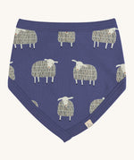 Pigeon Organics bib. A 100% GOTS organic cotton bib in pale blue with a white sheep print all over