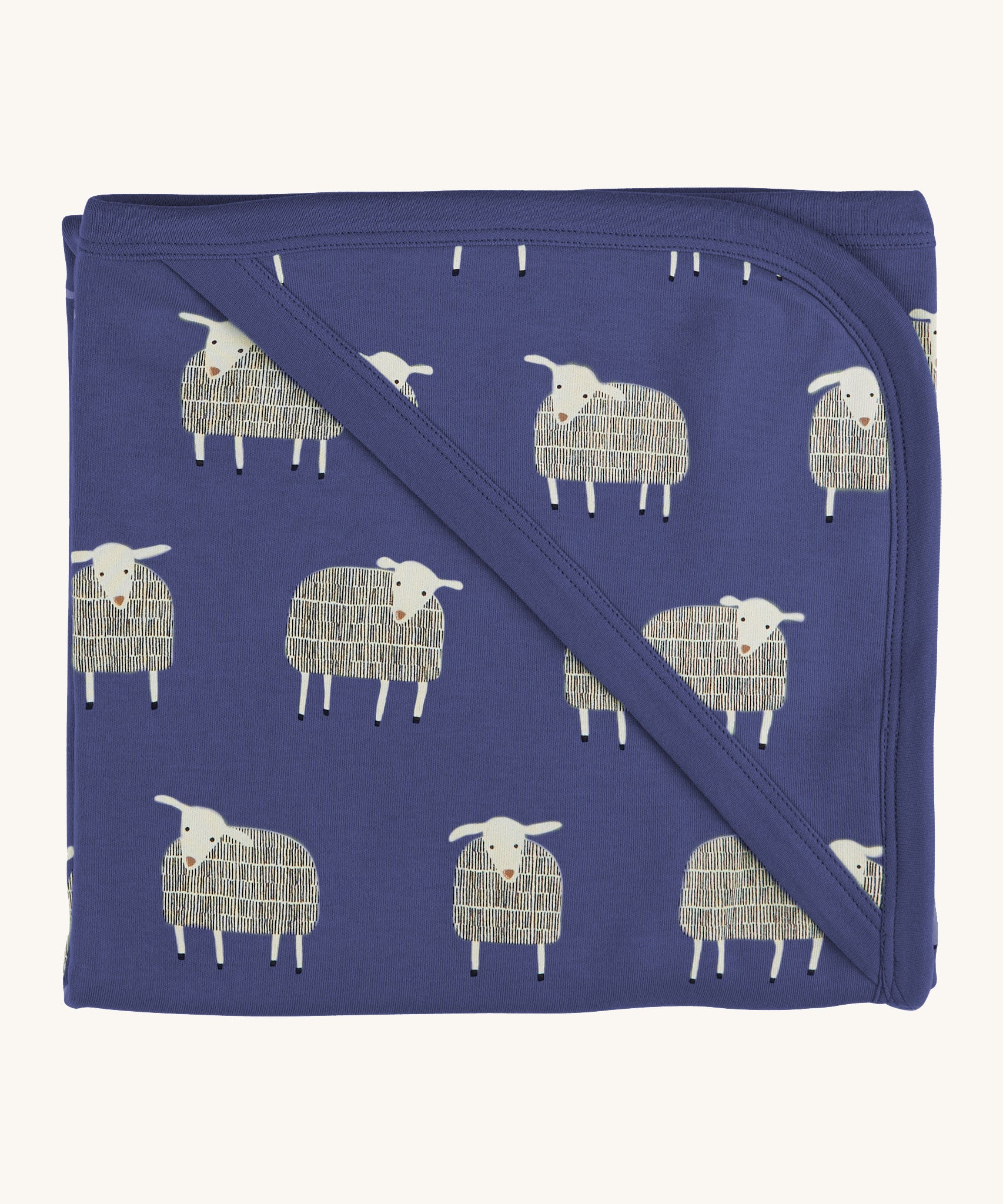 Pigeon Organics hooded blanket. A 100% GOTS organic cotton navy hooded blanket with white sheep printed all over. 
