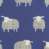 A close up of the navy sheep print on from Pigeon organics available at Babipur showing 