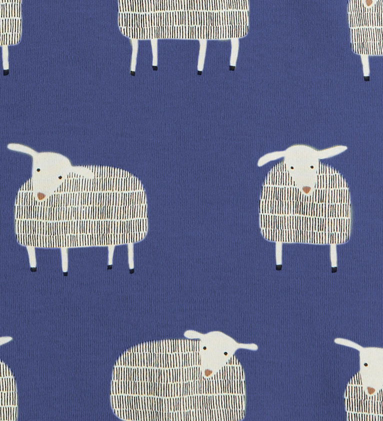 A close up of the navy sheep print on from Pigeon organics available at Babipur showing 