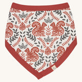 Pigeon Organics bib with a squirrel design. A 100% GOTS organic cotton bib in white with a cute floral and squirrel design printed all over. Features a pale rust trim.