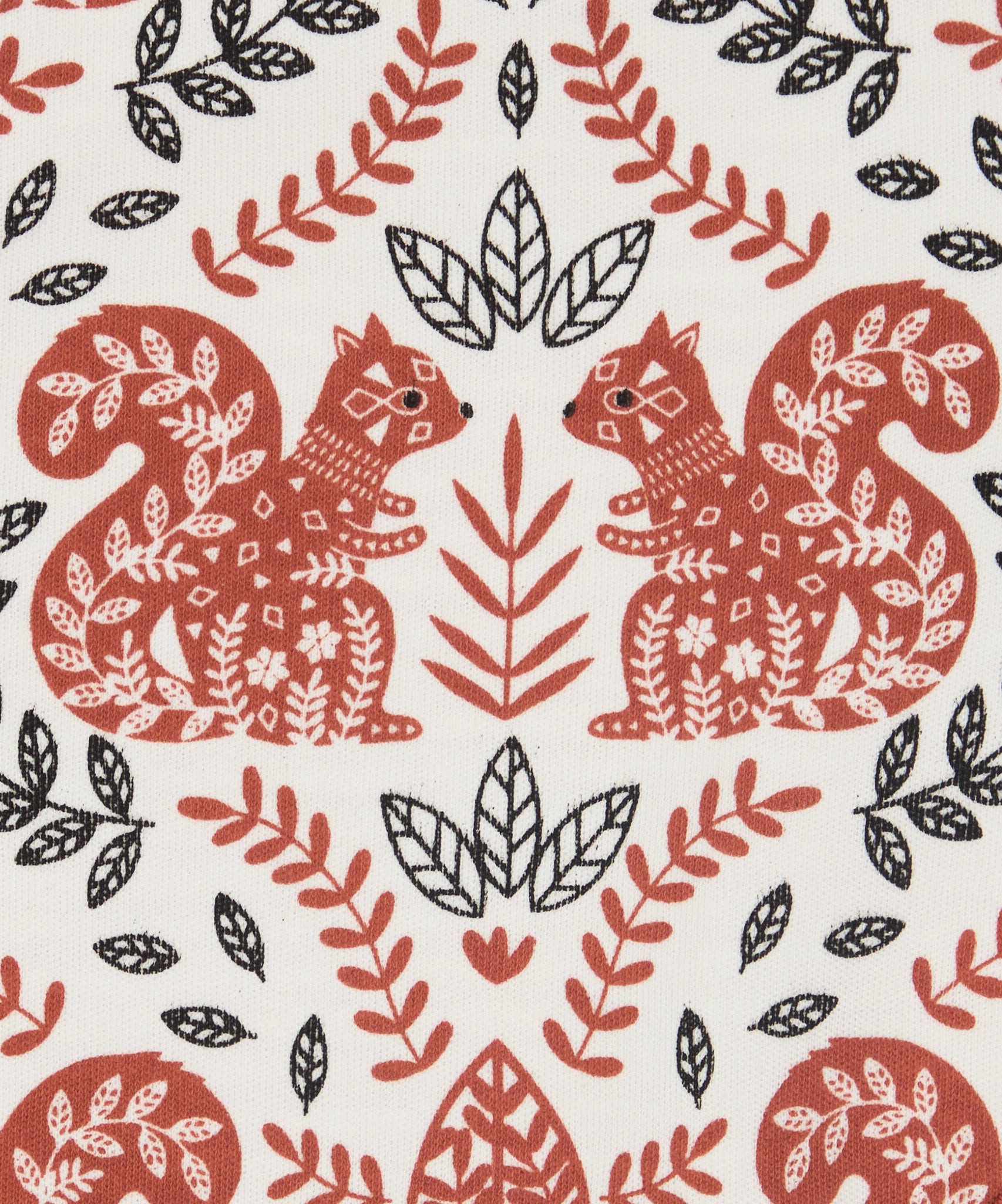 Close up of the Pigeon Organics squirrel and leaves design printed on organic neutral colour cotton fabric.