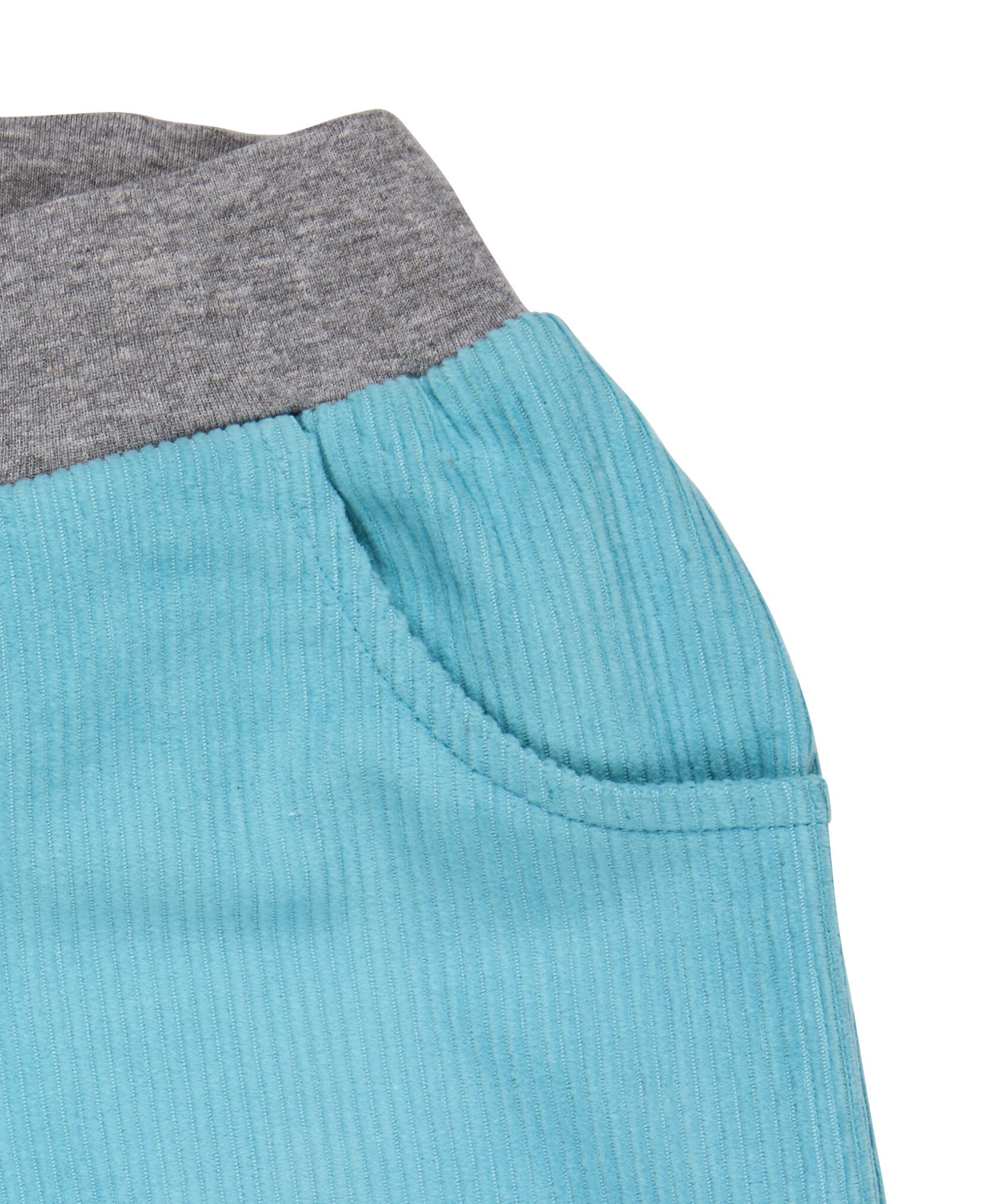 A close up of the Pigeon Organics lined cord trousers available at Babipur showing the grey elasticated waistband detail and side pocket