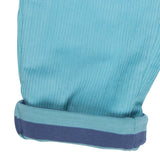 A close up of the Pigeon Organics lined cord trousers available at Babipur showing the blue striped design on the inner liner 