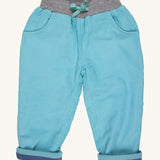 Pigeon Organics lined cord trousers - GOTS turquoise coloured organic cotton trousers in a corduroy style. Features 2 side pockets, a soft elastic waistband in grey and turquoise drawstring detail at the front.
