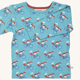 Pigeon Organics turquoise cycling fox t-shirt - GOTS organic cotton t-shirt with long sleeves. Features multiple prints of a fox riding a blue bike.