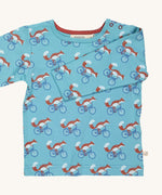 Pigeon Organics turquoise cycling fox t-shirt - GOTS organic cotton t-shirt with long sleeves. Features multiple prints of a fox riding a blue bike.