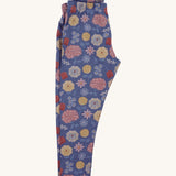 Pigeon Organics leggings - GOTS organic cotton leggings in navy blue. Features multiple prints of multicoloured artistic prints of flowers and leaves.
