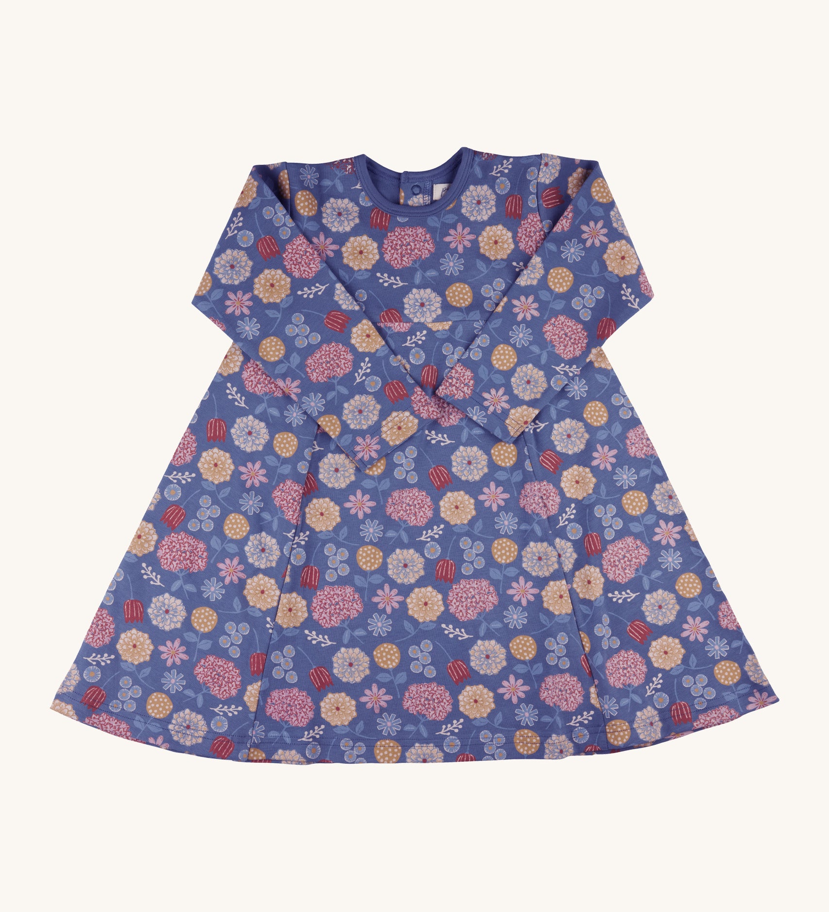 Pigeon Organics pinafore dress - GOTS organic cotton navy long sleeved dress with a popper fastener on the back for easy fitting. Features multiple prints of multicolour artistic flowers and leaves 