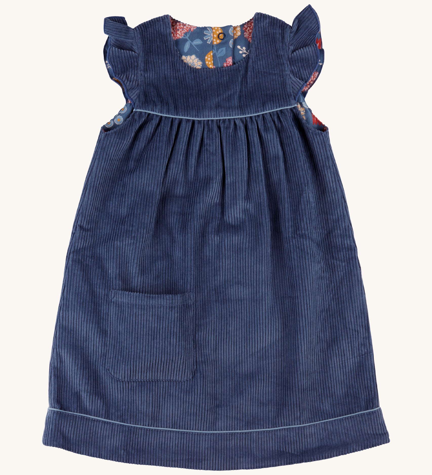 Pigeon Organics reversible Winter shift dress in night blue - GOTS organic cotton sleeveless dress in a corduroy style with a reversible winter bloom design. Features a small pocket on the bottom of the dress.
