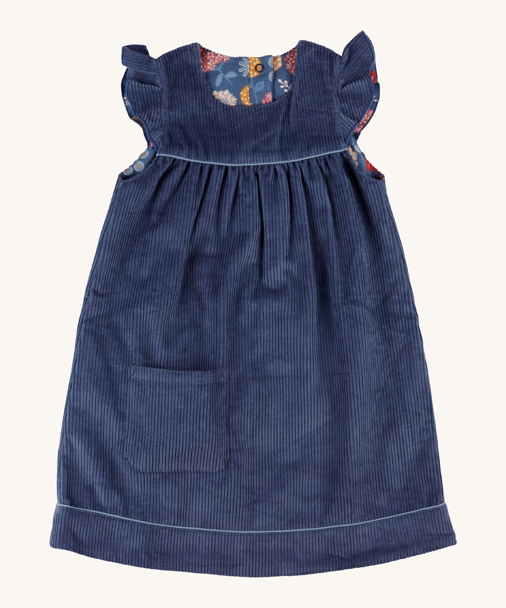 Pigeon Organics reversible Winter shift dress in night blue - GOTS organic cotton sleeveless dress in a corduroy style with a reversible winter bloom design. Features a small pocket on the bottom of the dress.