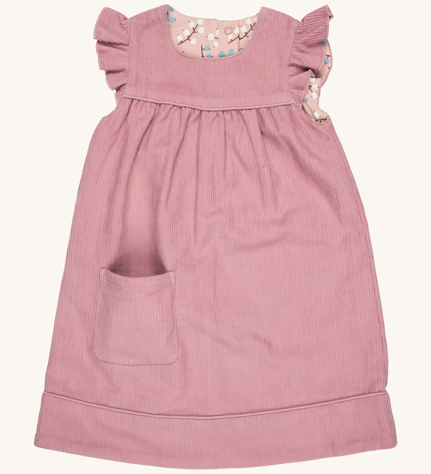 Pigeon Organics reversible Winter shift dress in pink - GOTS organic cotton sleeveless dress in a corduroy style with a reversible winter berry design. Features a small pocket on the bottom of the dress and popper fasteners for easy fitting