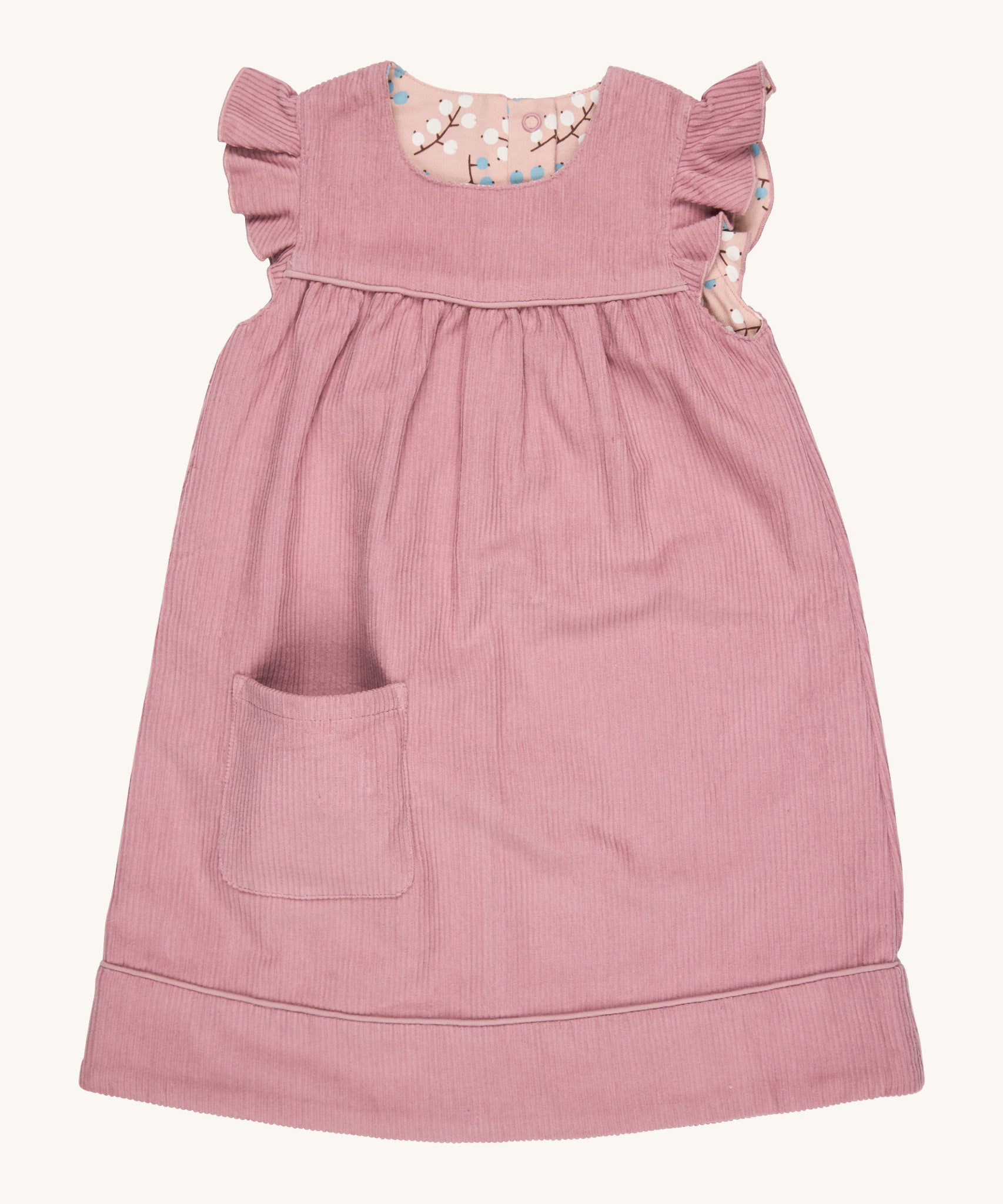 Pigeon Organics reversible Winter shift dress in pink - GOTS organic cotton sleeveless dress in a corduroy style with a reversible winter berry design. Features a small pocket on the bottom of the dress and popper fasteners for easy fitting