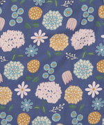A close up of the navy winter shift print detail on the Pigeon organics navy winter shift dress showing available at Babipur