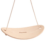 A close up of the The PlanToys Balance Board with the rope attached to both sides on a plain background. 
