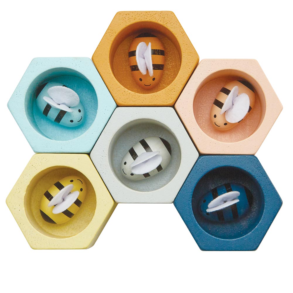 The PlanToys Bee Hives in  Orchard colour way on a plain background. 
