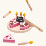 PlanToys wooden birthday cake set. Includes pink and brown slices, serving plate, candles and a chalkboard to write on