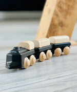 PlanToys black wooden classic toy train. Three carriages with magnetic connectors. 