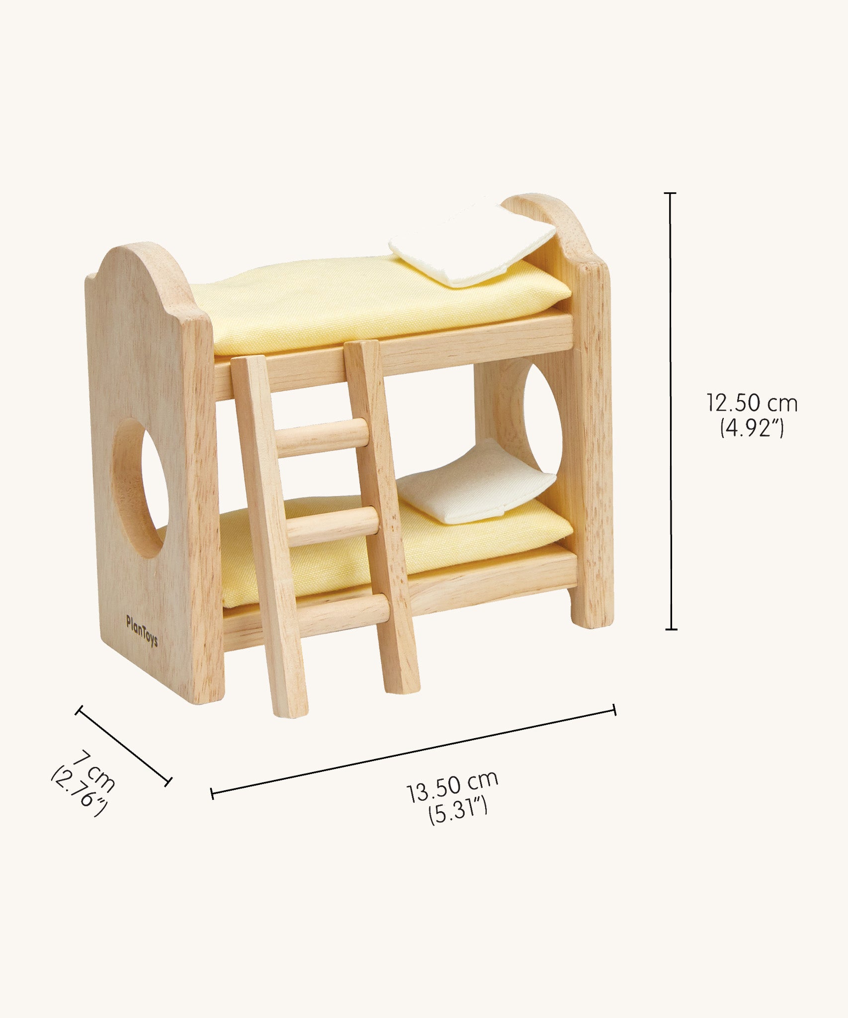 A close up of the bunk bed from the PlanToys Classic Children's Bedroom dolls house furniture set showing the dimensions of the bed