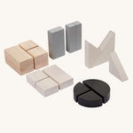 Plan Toys Fractions Blocks on a plain background.