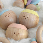 Plan Toys Pastel Sensory Tumbling surrounded by other toys from the Plan Toys pastel baby collection. 