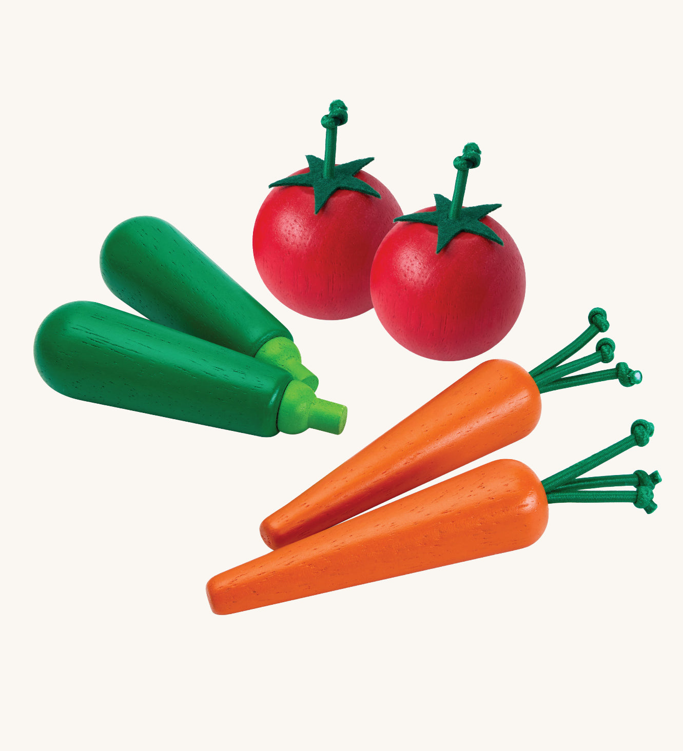 Plan Toys Produce Vegetable Set containing wooden Carrots, Courgettes & Tomatoes play food.