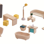 The pieces of furniture included with the PlanToys Slide N Go Dolls' House. 