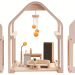 The PlanToys Slide N Go Dolls' House shown with the pieces separated on a plain background. 