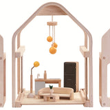 The PlanToys Slide N Go Dolls' House shown with the pieces separated on a plain background. 