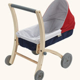 PlanToys stroller. Showing a wooden push bar, workign wheels and a blue and red base