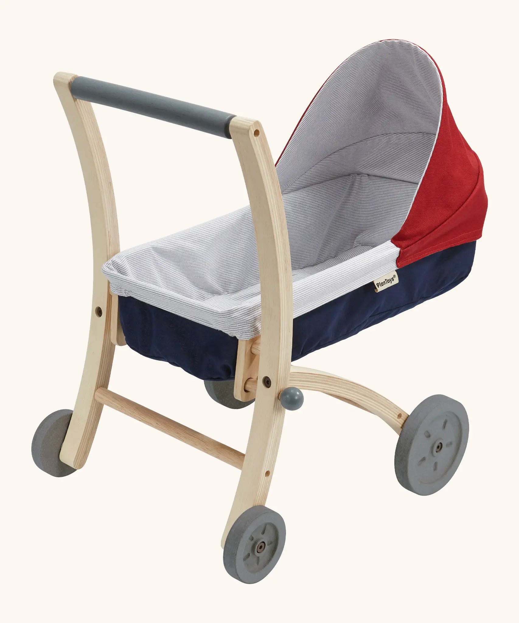 PlanToys stroller. Showing a wooden push bar, workign wheels and a blue and red base