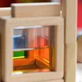 A close up of the yellow square block from the Plan Toys Water Blocks. 