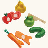 Set of 5 PlanToys wonky fruit and veg pieces with velcro tabs on the inside to pull. Includes a wooden knife