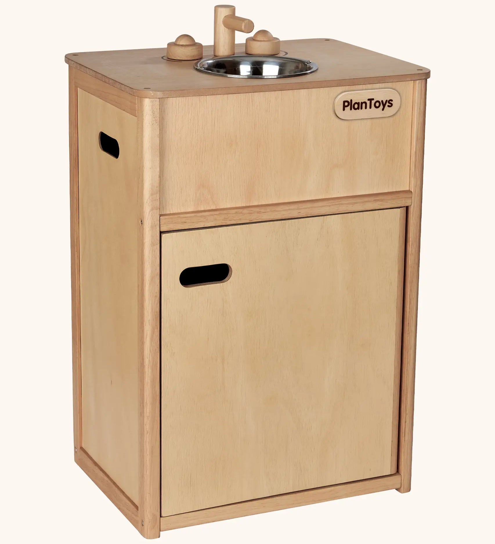 PlanToys wooden play sink. Features a bottom compartment, carry handles, tap knobs and a metal bowl