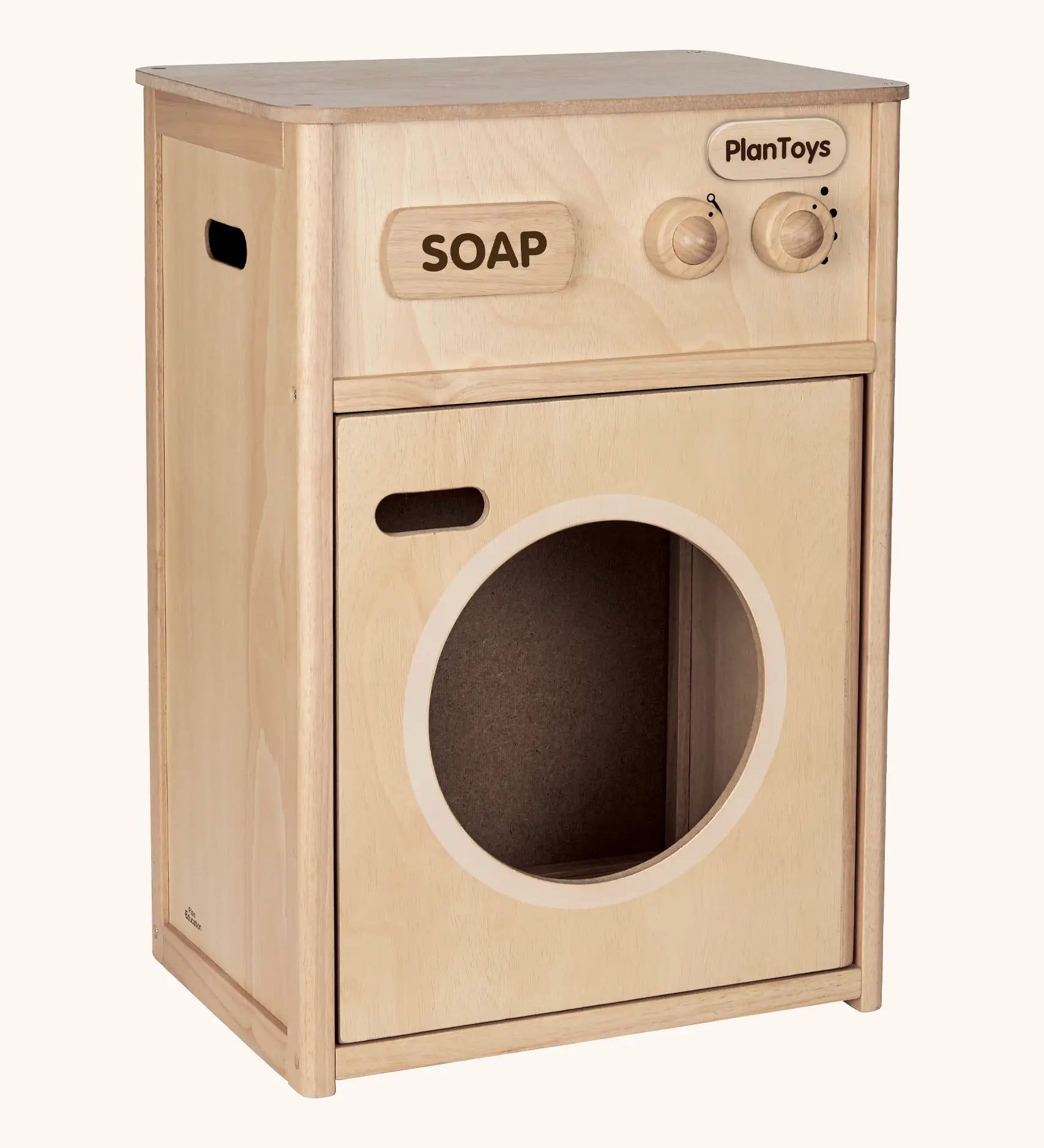 PlanToys wooden washing machine unit. Features working knobs and door 