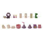 The pieces from the The PlanToys Fairytale Castle Blocks laid out on a plain background. 