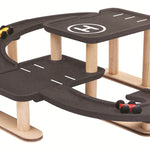A side view of the PlanToys PlanWorld Race N Play Parking Garage on a plain background.