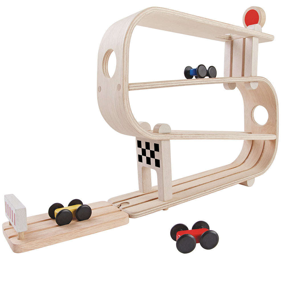 The PlanToys Ramp Racer with all two cars on the track and ones besides it on a plain background. 