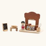 Back of the PlanToys bakery shop wooden toy playset.