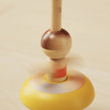 PlanToys wooden ballet spinning top in action