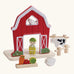PlanToys barn house small world play set. Red wooden barn, mini veg patch, fences, cow, sheep, hen and farmer figure. 