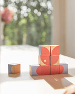 Close up of the PlanToys Waldorf stacking geo blocks