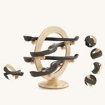 PlanToys Curvy Click Clack marble run on a plain background with close ups of different parts of the tracks in circles. 