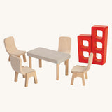 PlanToys Dining Room set for dolls house on a plain background. 