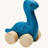 A PlanToys Diplo Dino wooden Car toy. A blue coloured diplodocus dinosaur on wheels. PlanToys range of toys are made from sustainably sourced rubberwood, we're proud stockists of PlanToys here at Babipur. 