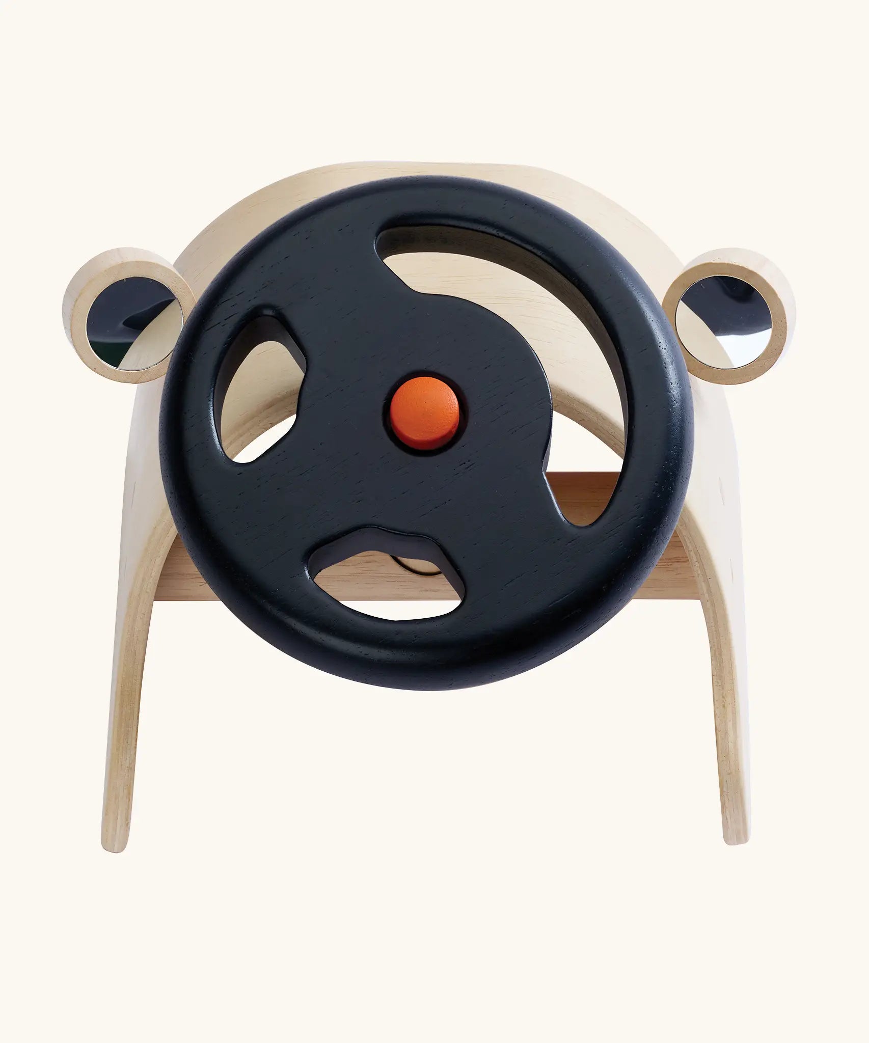 PlanToys Driving Console wooden toy. Black steering wheel with orange button in the middle on a wooden dashboards with wing mirrors.